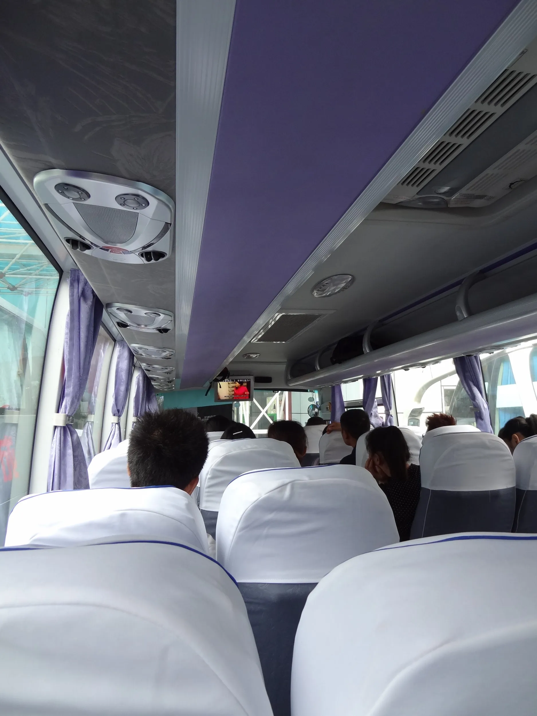 黄龍渓(黄龙溪)へ行くバスの中